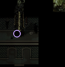 A dark statue looms overhead.; highlighted search position